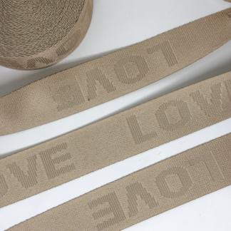 CINTA BAJO RELIEVE LOVE BEIGE